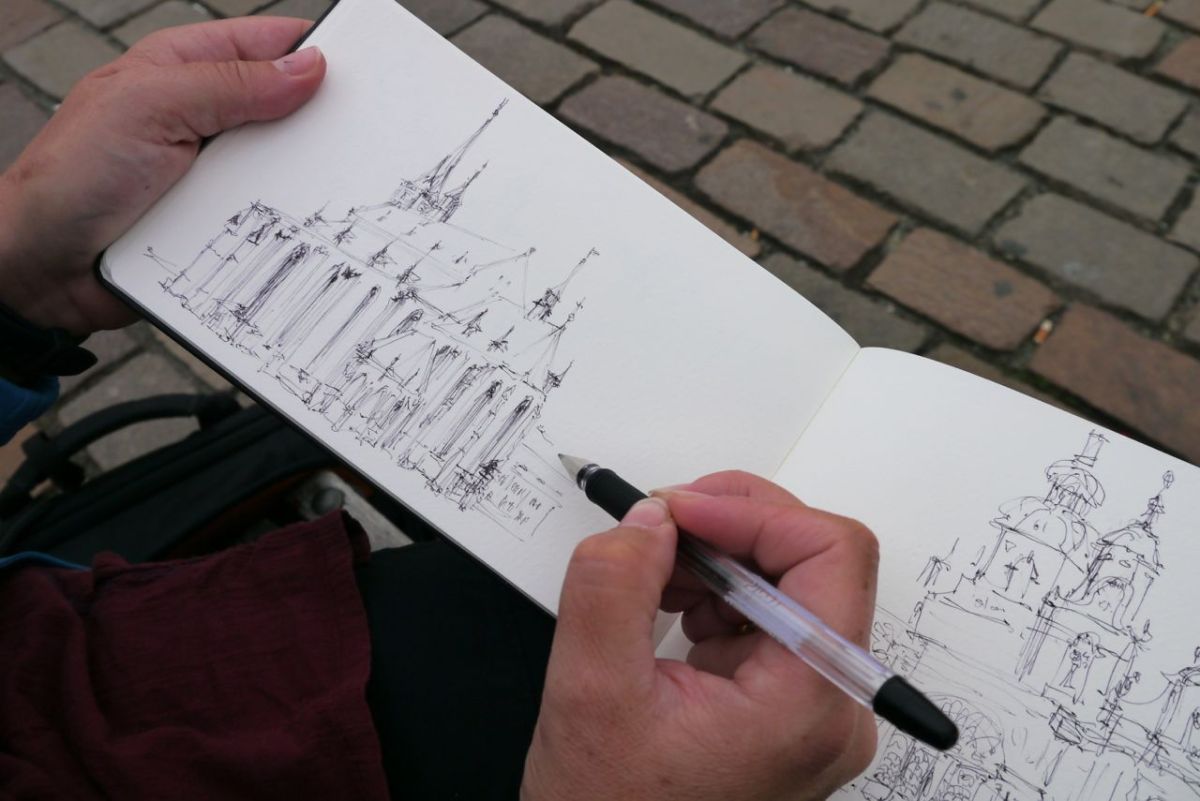 Esther drawing the cathedral, Plzen.